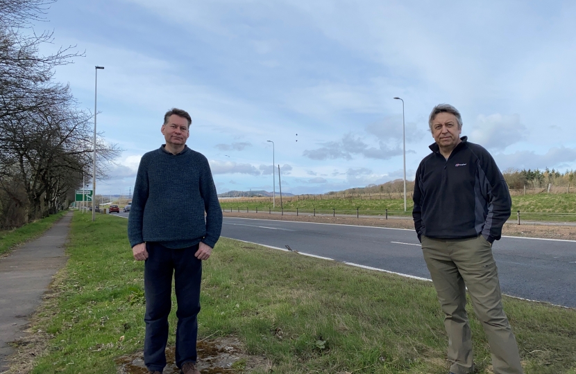 Murdo Fraser with Cllr Forbes on the A90 Perth to Dundee road