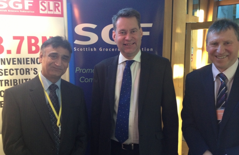 Saleem Saddiq and Dennis Williams of SGF National Executive with Murdo Fraser