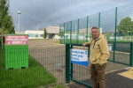 Councillor Forbes beside Invergowrie Primary School