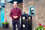 Councillor Keith Allan beside the public toilets in Auchterarder 